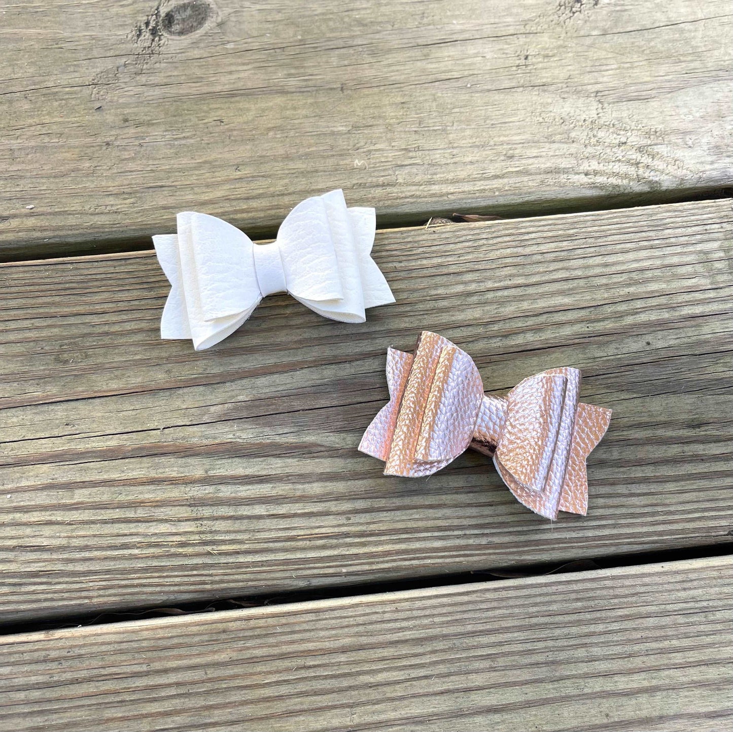 pink faux leather bow